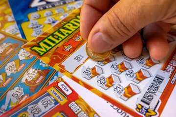 Lottery scratch card. Scratch card lottery, fortune ticket. Scratch the lucky numbers with the coin. Illustrative editorial